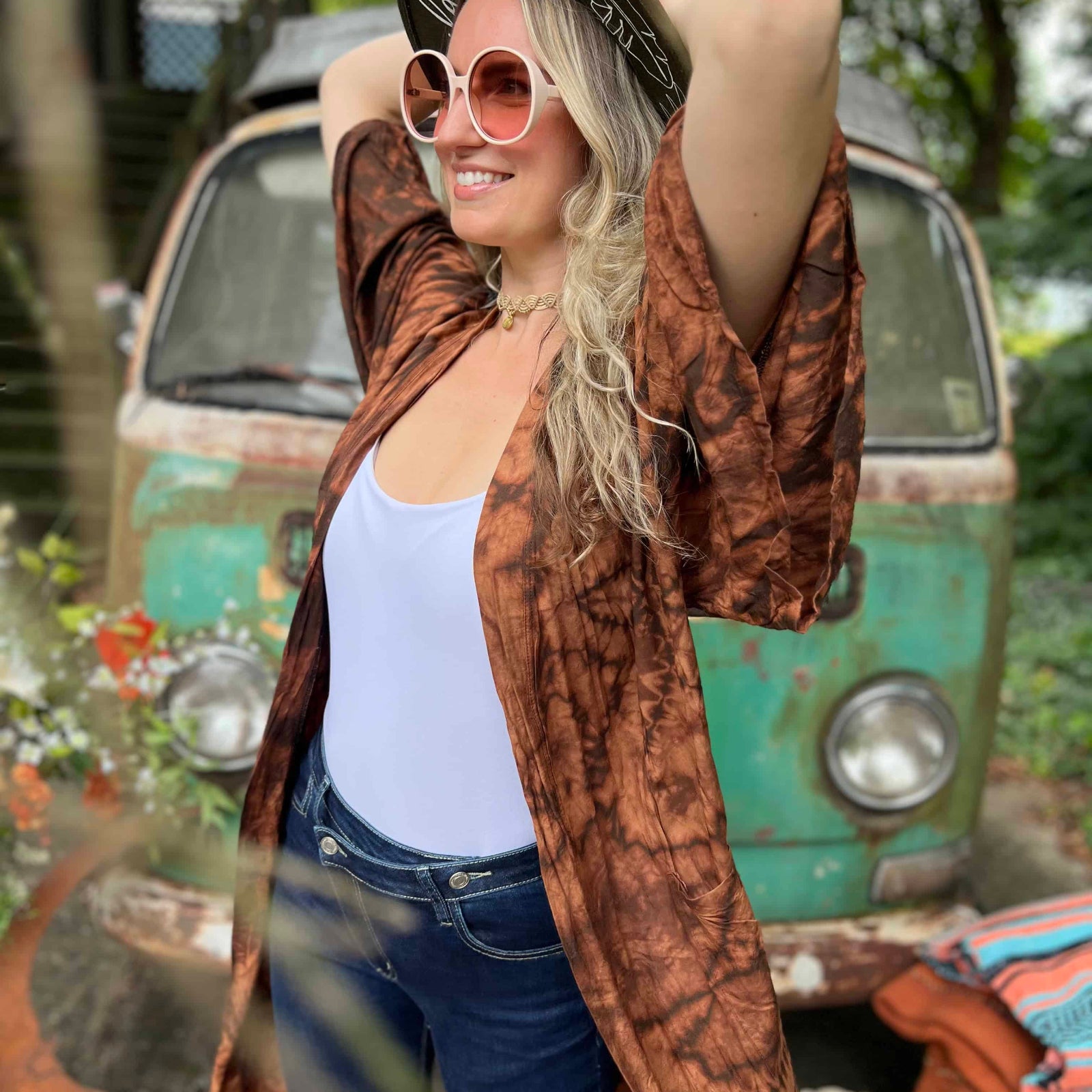 Side angle of earthy brown boho hand-dyed kimono with wide sleeves