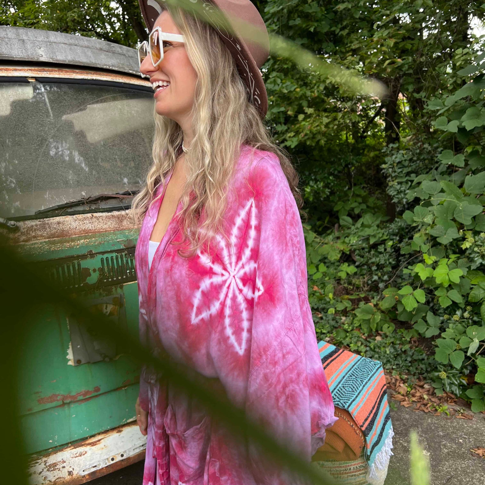 Close-up of pink lotus flower tie dye on boho kimono back