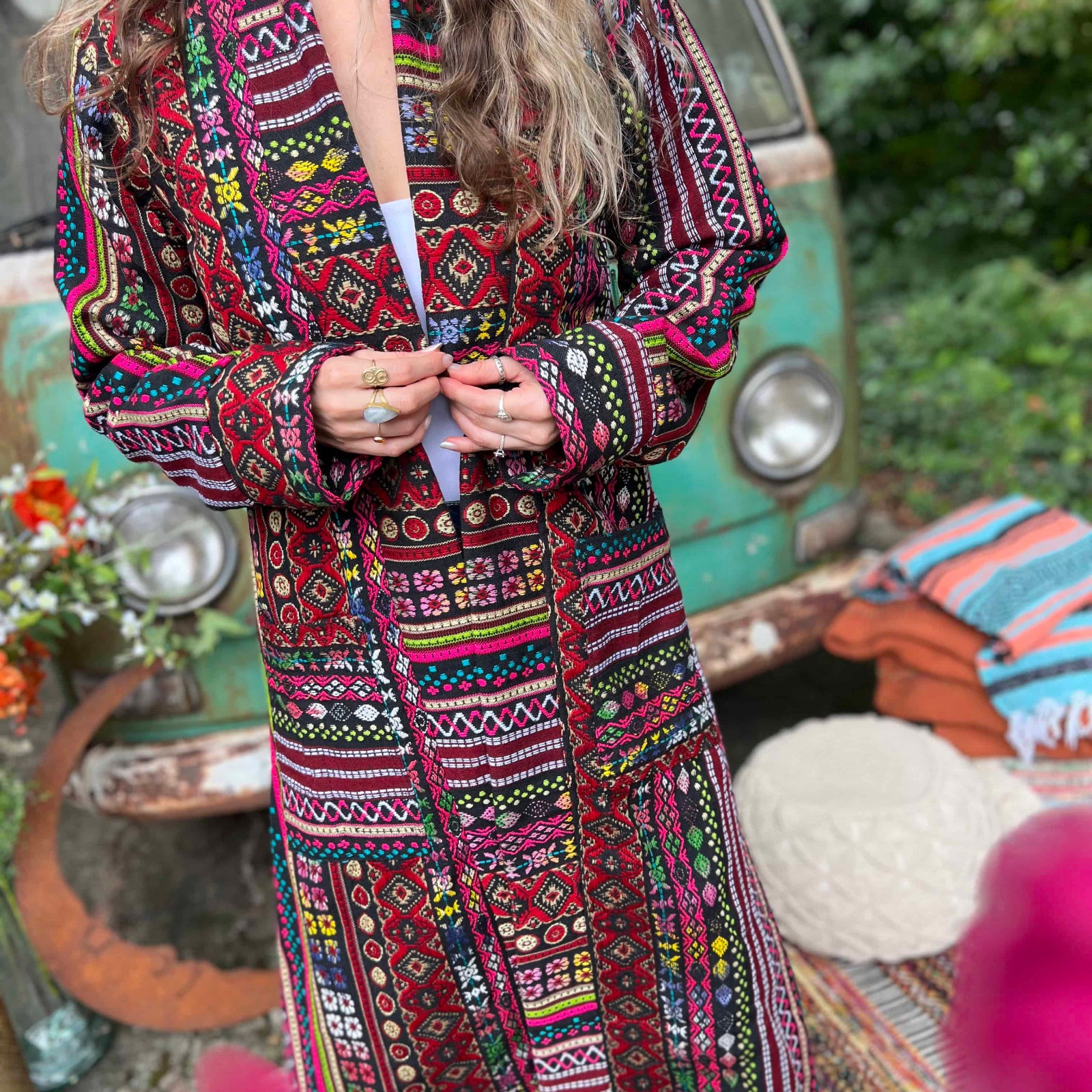Unisex boho trench coat worn open as layered festival outfit