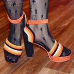 Chunky platform candy corn heels with retro vibe.