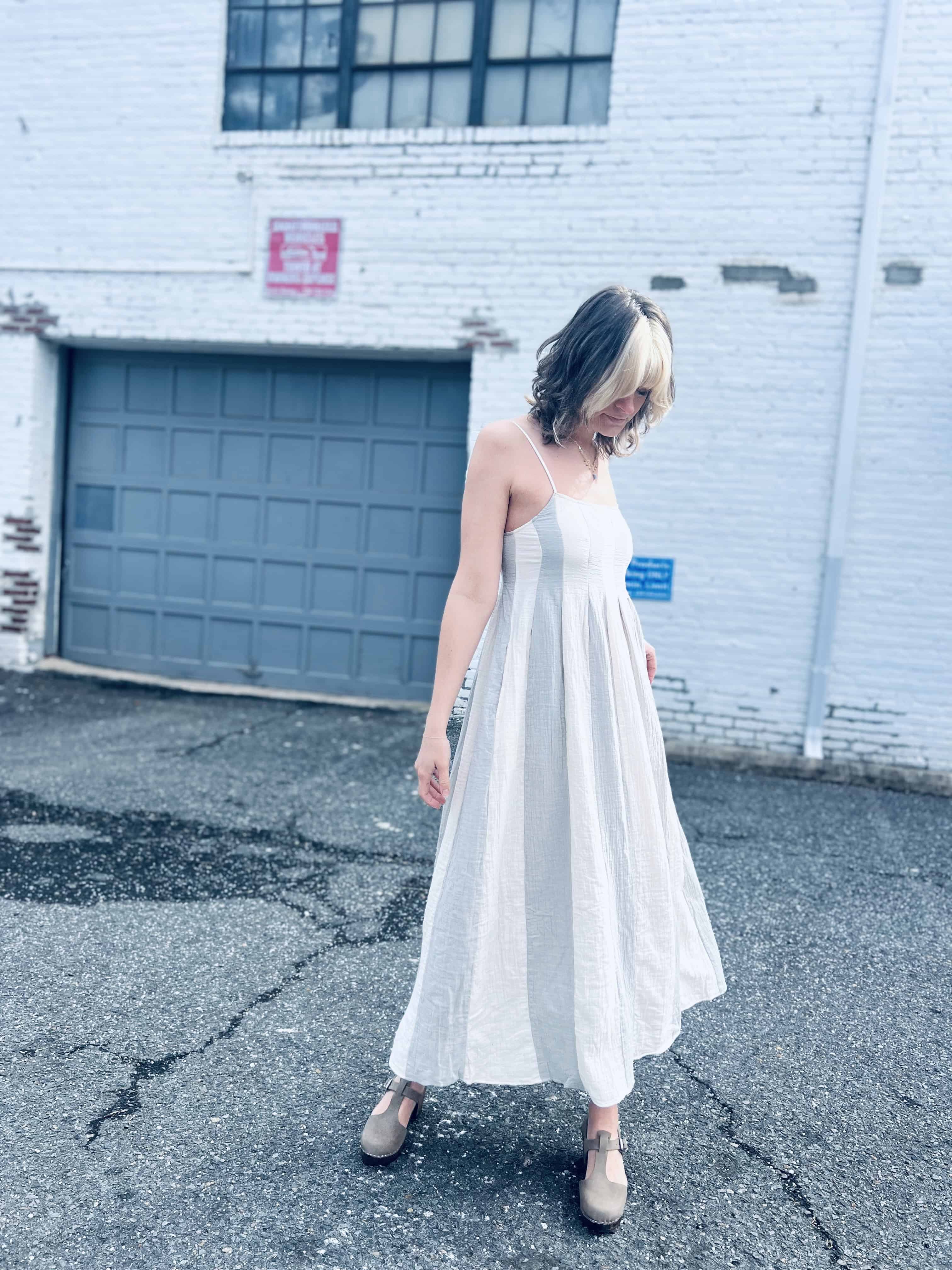 trendy festival outfit featuring a striped pintuck midi dress
