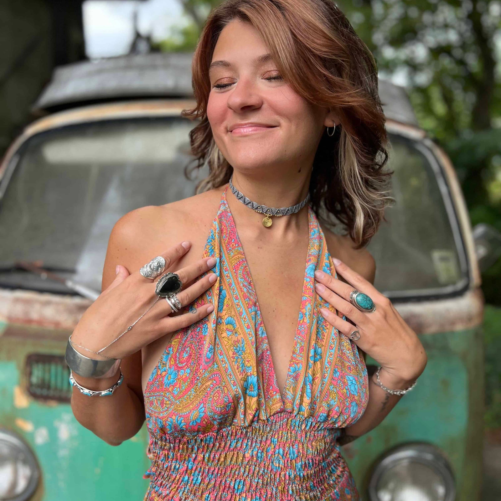 Back shot of hippie style bohemian silk maxi dress with bow tie
