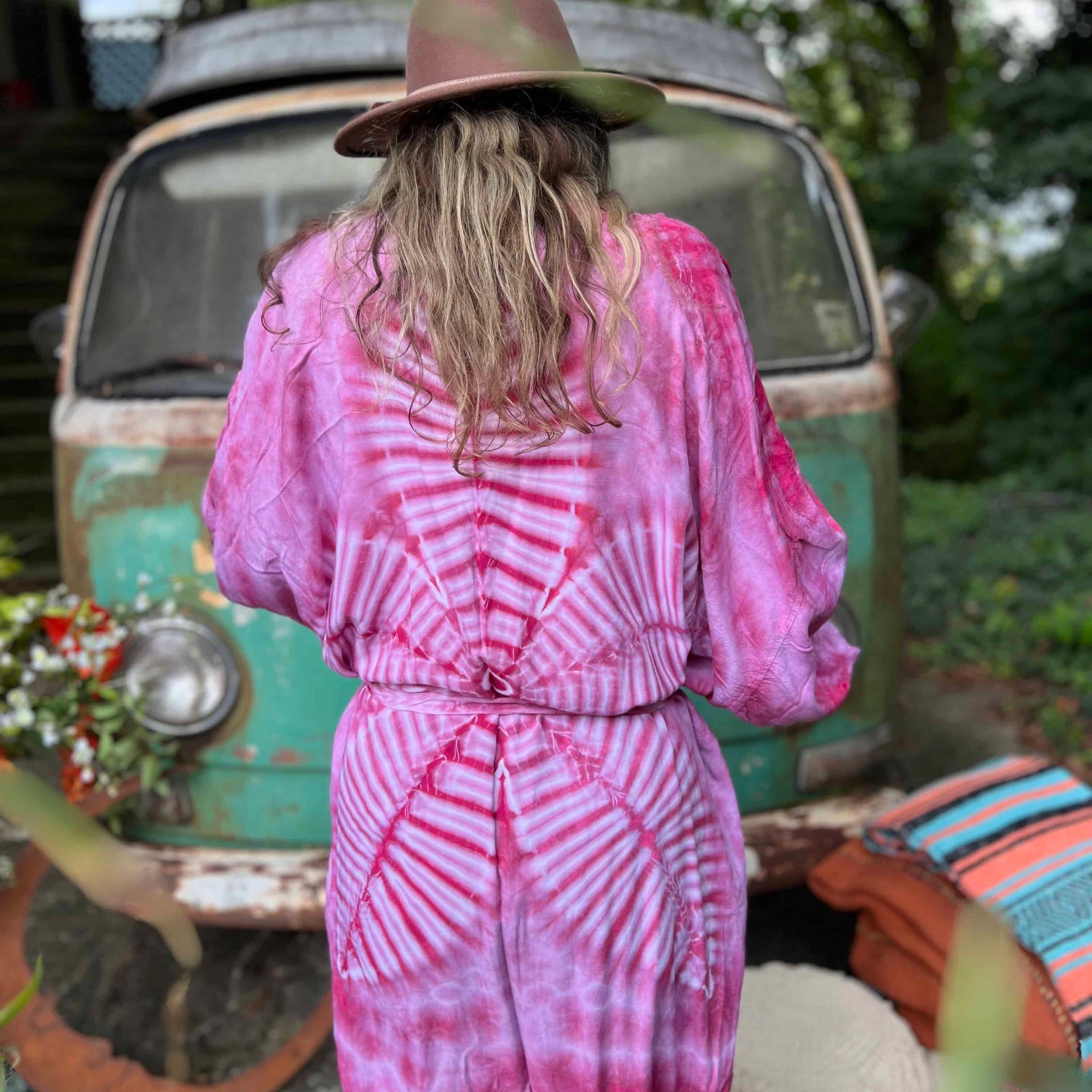 Back designs of hand-dyed lotus flower kimonos in assorted colors