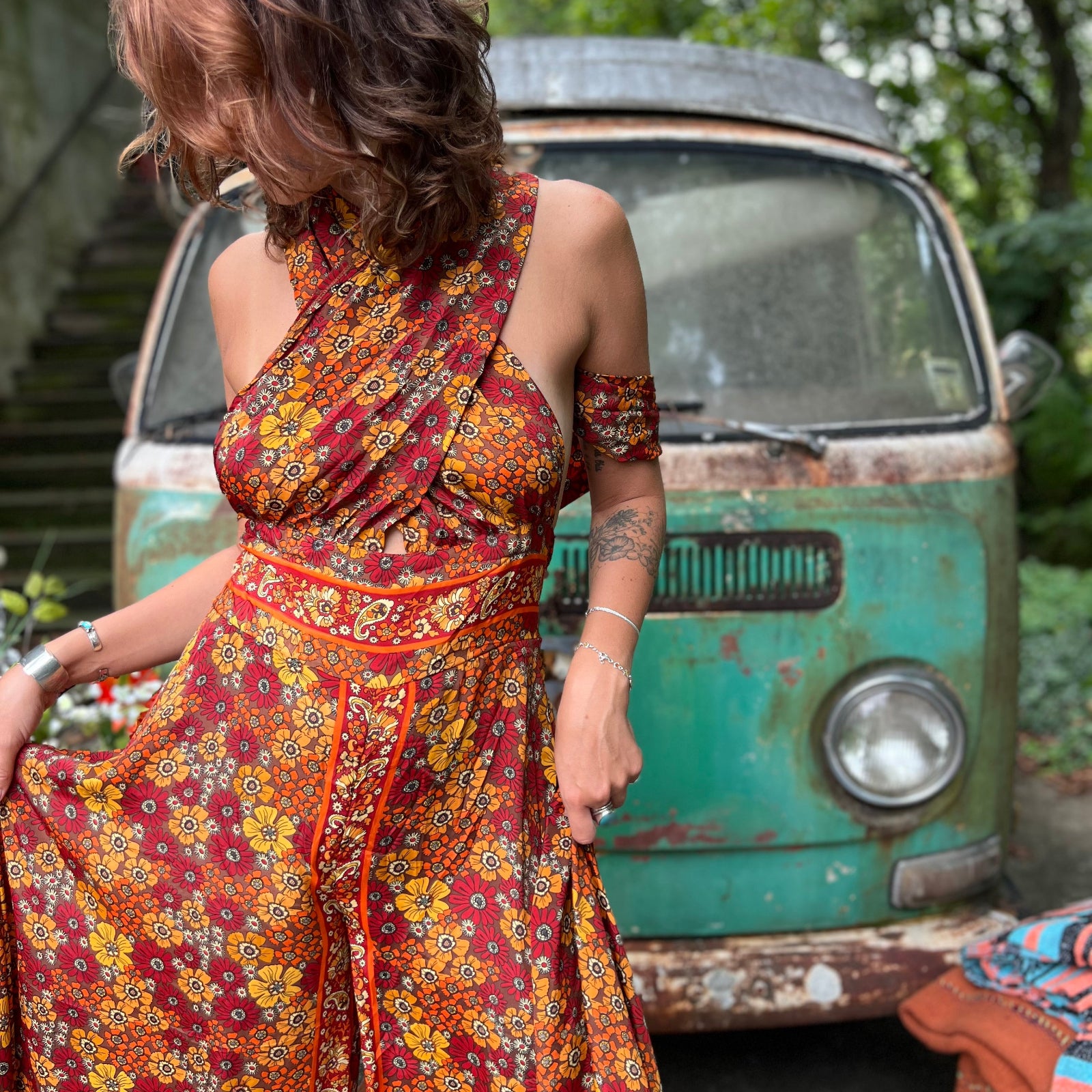 Plus size model in colorful bohemian silk wide leg jumpsuit