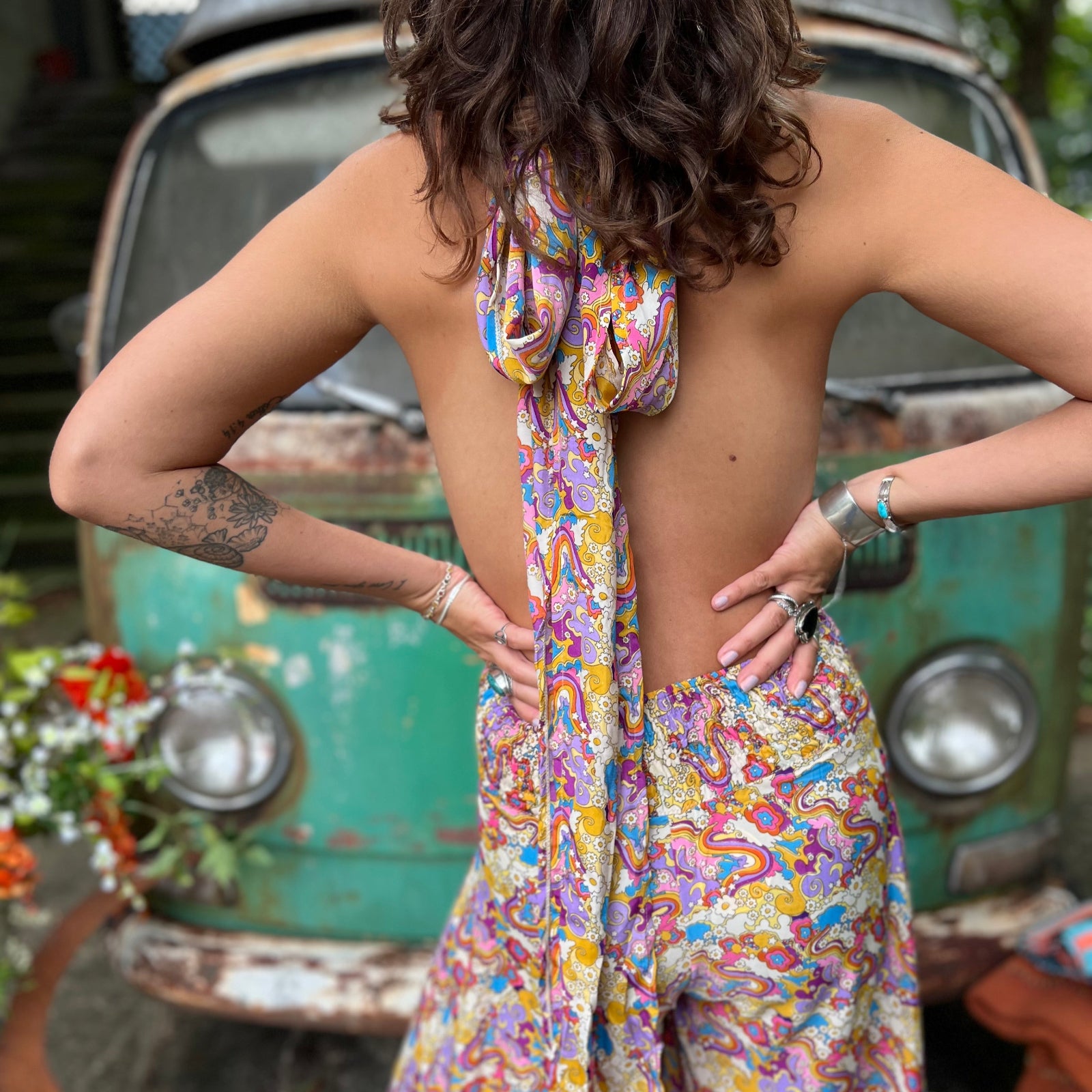 TikTok viral rainbow jumpsuit with backless halter styling