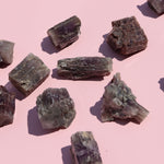 Mineral samples on a pink background