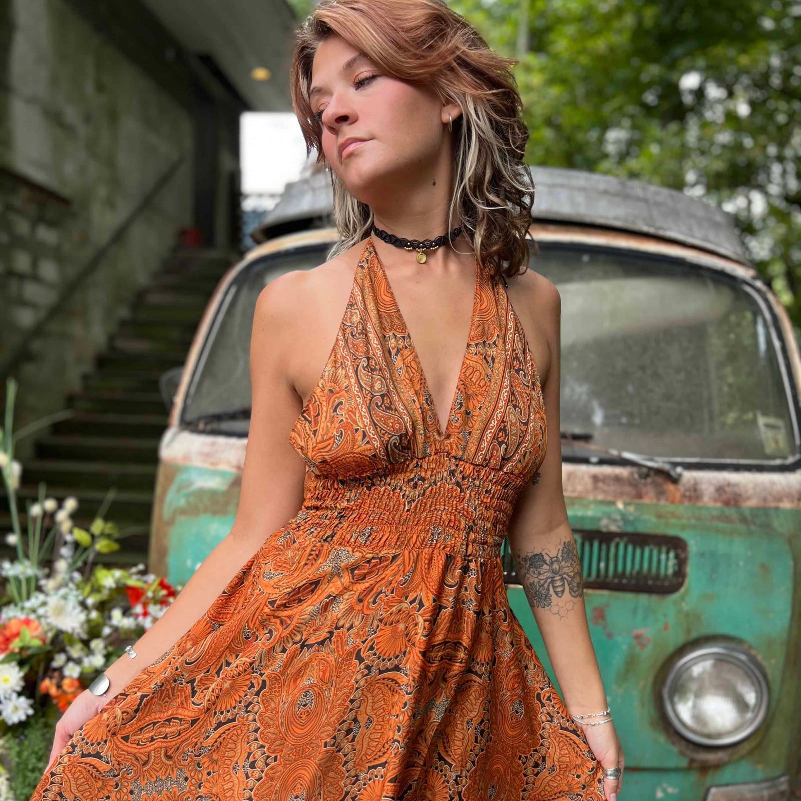 Close-up of tiered silk fabric detail on boho maxi dress
