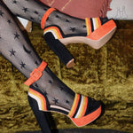 Striped platform Halloween heels with chunky retro heel.