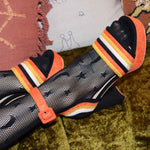 Cosplay candy corn heels with retro chunky platform.