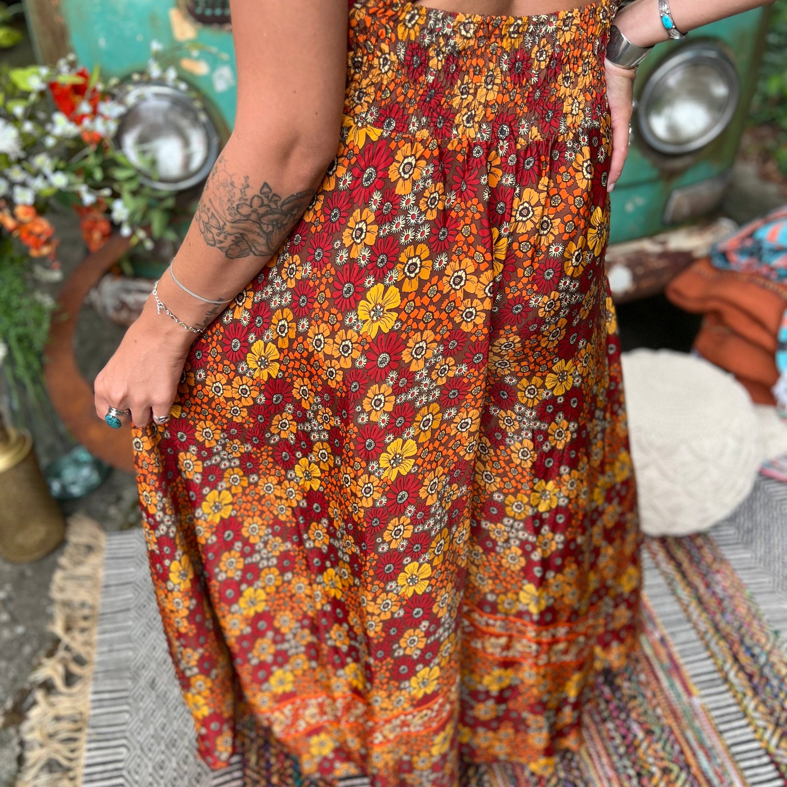 Convertible boho jumpsuit styled with one-shoulder tie
