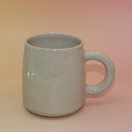 Back view showing smooth, speckled ceramic surface