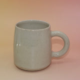Back view showing smooth, speckled ceramic surface