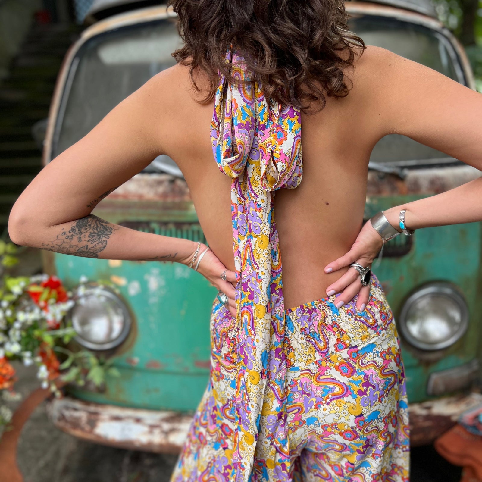 Hippie style rainbow jumpsuit with fringe accessories