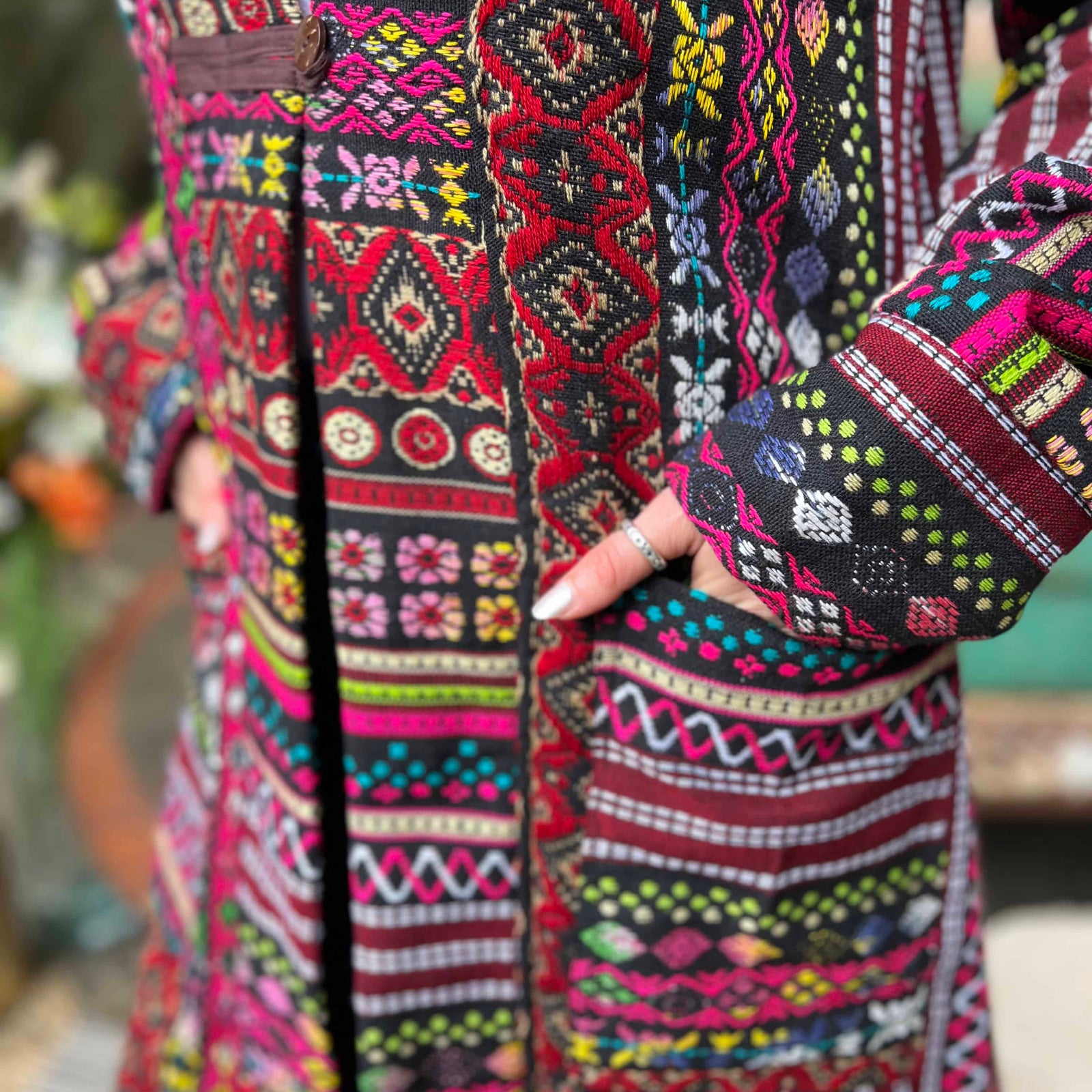 Close-up of woven festival boho jacket sleeve texture