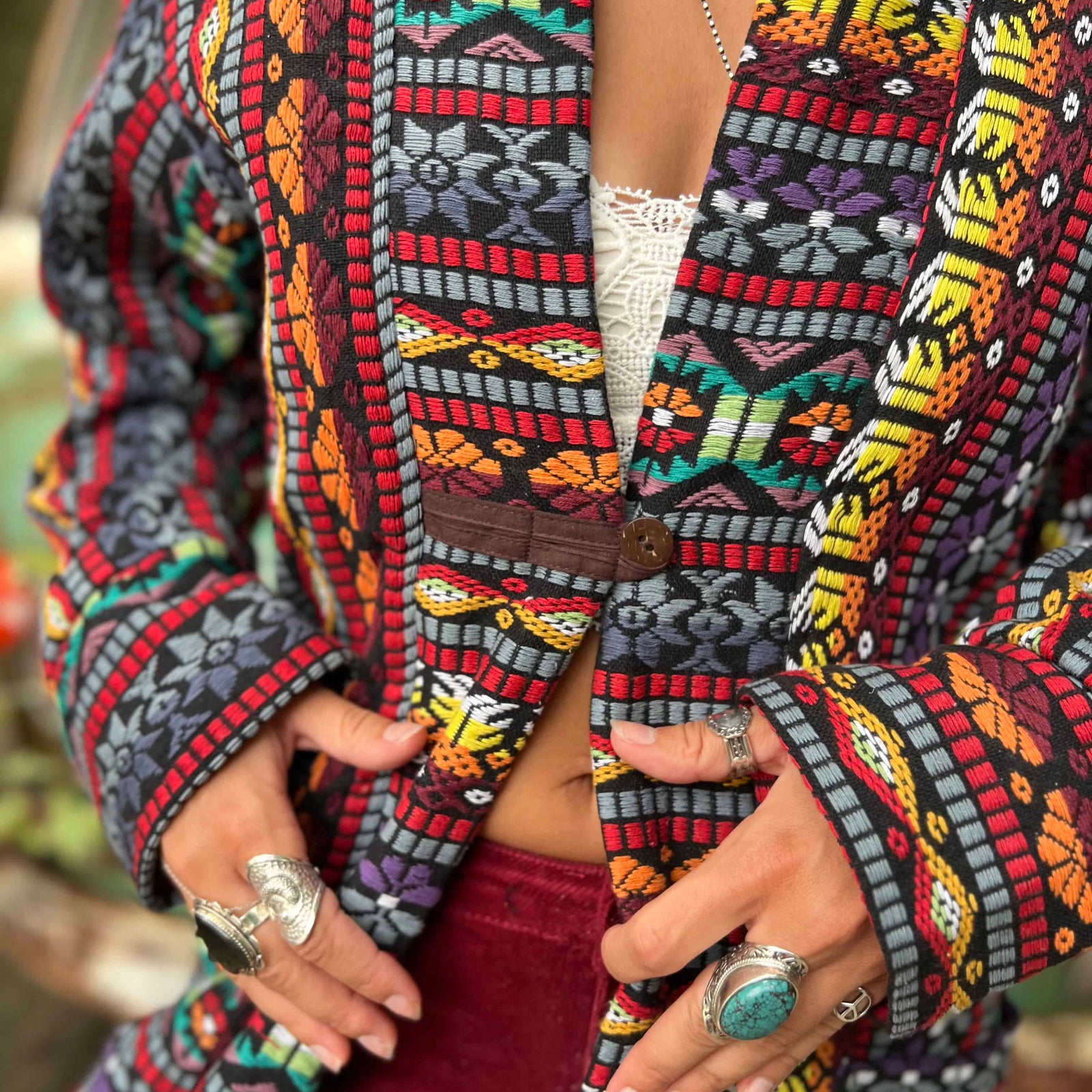 Front view of unisex long hippie boho jacket festival trench coat