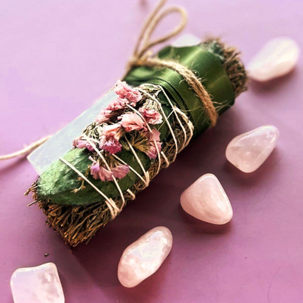Sage smudge sticks and traditional smudging tools for ritual cleansing