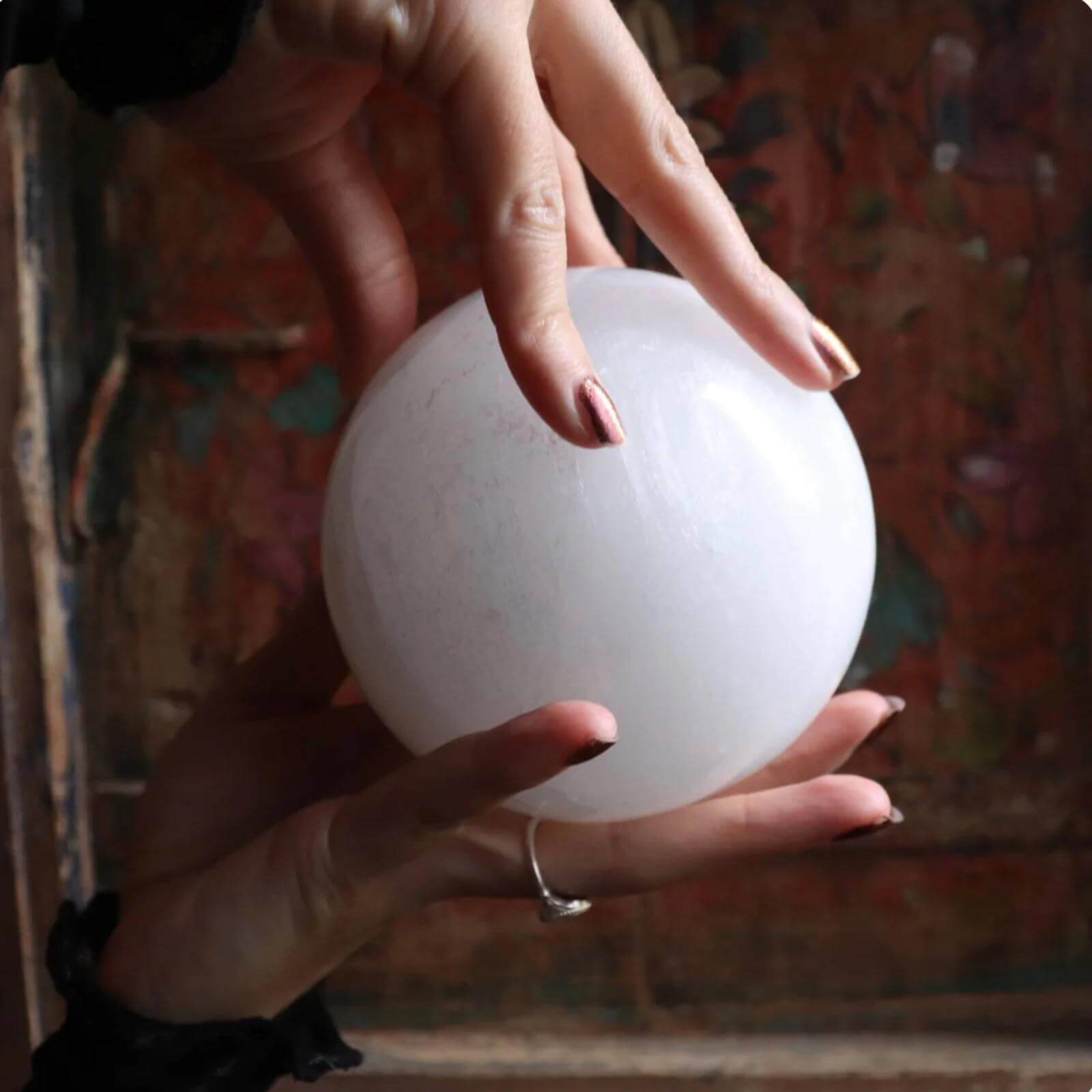 Crystal decor collection thumbnail featuring a selenite crystal sphere styled as intentional bohemian home decor