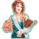 A Chappell Roan sticker depicting a female figure with red hair, wearing a green dress and a sash, holding a trophy and a bouquet of flowers.