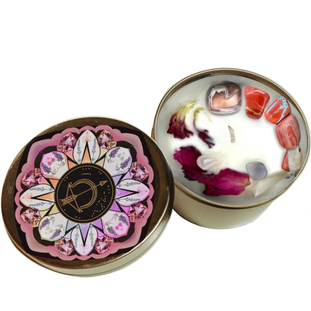 The Sagitarius Crystal Candle opened with the lid to the right of it on a white background.