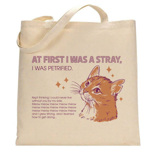 The 'At First I Was a Stray' cat tote on a white background.