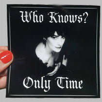 Sticker with a black and white portrait and text 'Who Knows? Only Time' held by a hand.