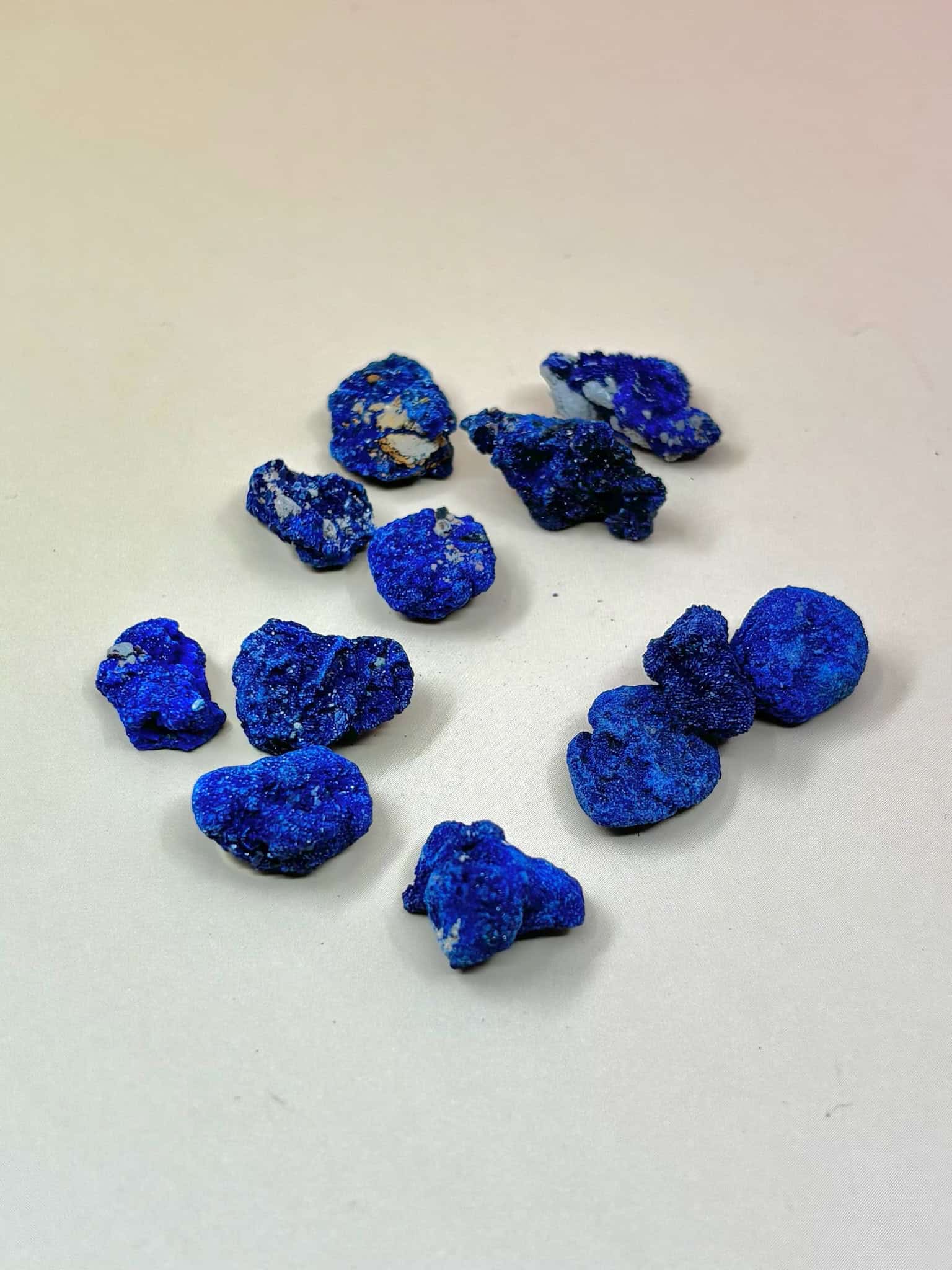 azurite blueberries on pale orange background