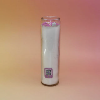 Glass candle with a QR code label on a gradient background