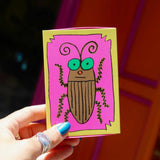 Illustrated box featuring bug artwork