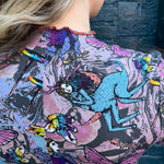 Whimsical butterflies and mythical creatures print close-up on top