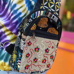 Zoomed-in texture and floral pattern on crossbody bag