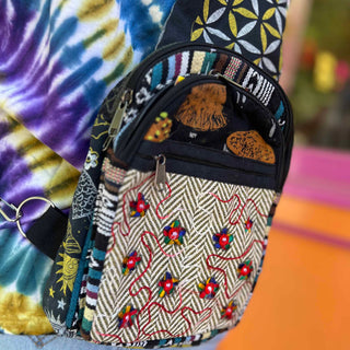 Zoomed-in texture and floral pattern on crossbody bag