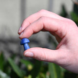 Mini Crystal Gemstone Mushrooms between fingers for size reference
