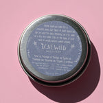The back of the Lavandula Sleep Salve on a pink background.