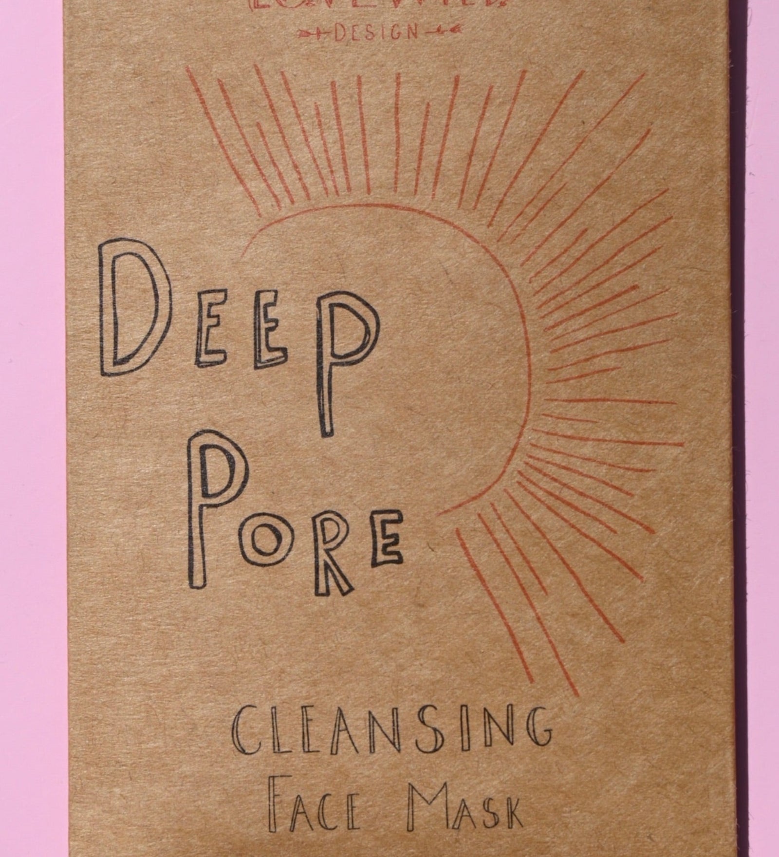The Deep Pore Cleansing Clay Mask on a pink background.