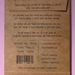 The back of the Antioxidant Mask on a pink background.