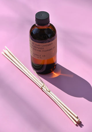 The P.F. Candle Co. Ojai Lavender - 3.5 oz Reed Diffuser on a pink background