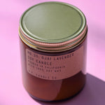 The P.F. Candle Co. Ojai Lavender - 7.2 oz Standard Soy Candle on a pink background.
