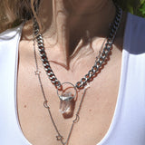 Someone wearing the Clear Quartz Athena Thick Chain Necklace.