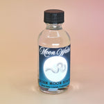 The Moon Charged Water with Crystal Chips on a peach background.