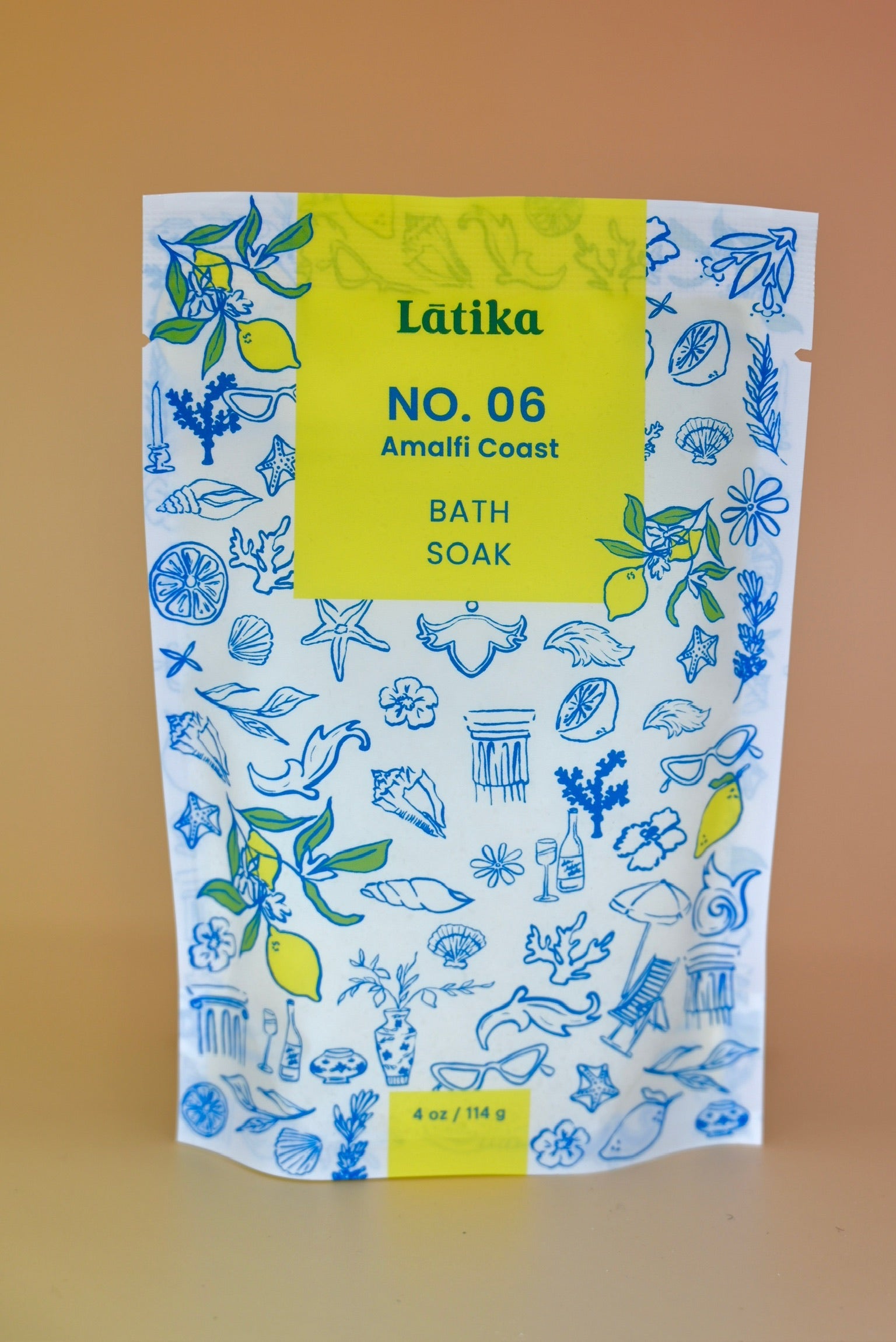 The Amalfi Coast Vegan Milk Bath Soak on a dusty pink background.