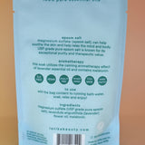 The back of the Melatonin Bath Soak for Sleep Assist on a dusty pink background.