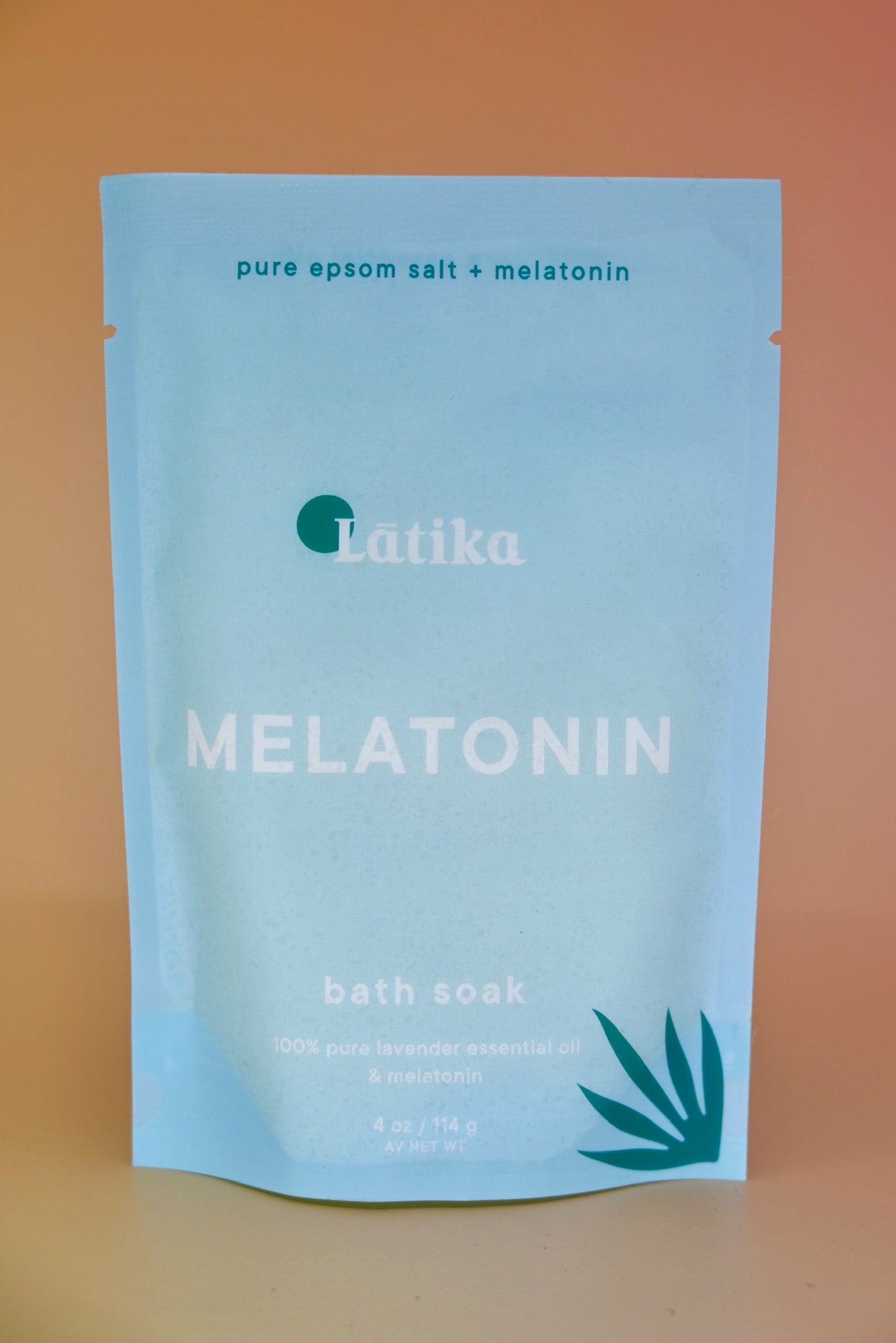 The Melatonin Bath Soak for Sleep Assist on a dusty pink background.