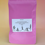 The  back of the Touch of Earl Grey Loose Tea Blend on a pink background.