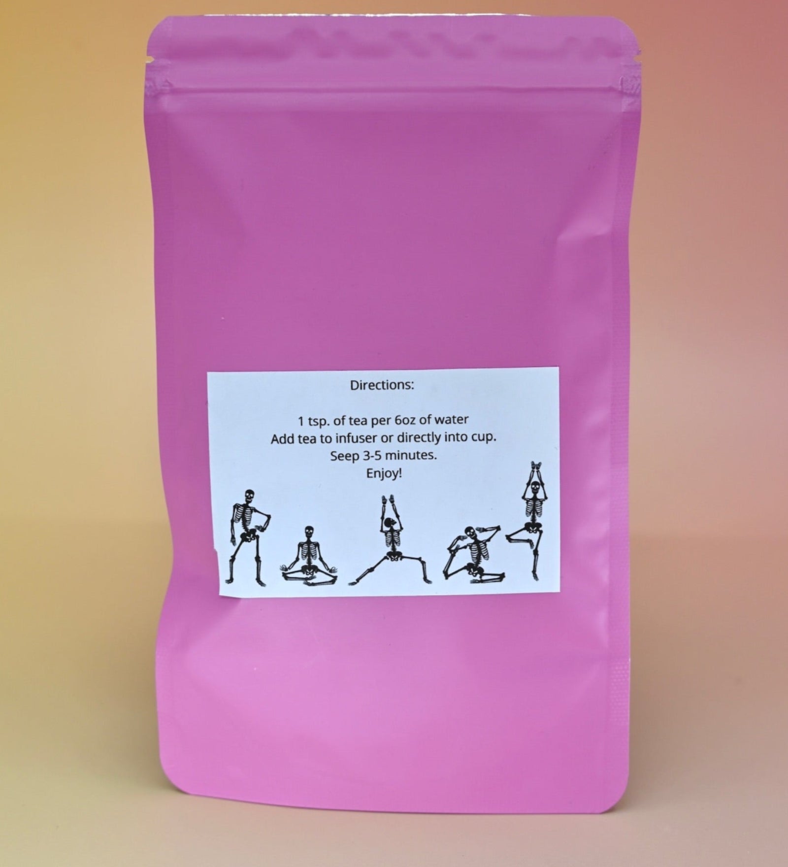The  back of the Touch of Earl Grey Loose Tea Blend on a pink background.