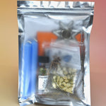 The Psychic Dreams Tea Leaf Reading and Ritual Kit on a pink and yellow background.