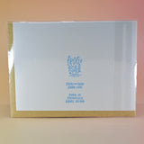 The back of the Mom Fact #46 Pregnancy Congratulations Greeting Card on a peach colored background.