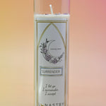 The Surrender Prayer Soy Wax Candle on a pink and yellow background.