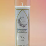 The Surrender Prayer Soy Wax Candle on a pink and yellow background.