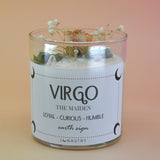 The Virgo Zodiac Crystal Candle on a peach colored background.