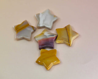 Crystal Gemstone Stars on pale orange background